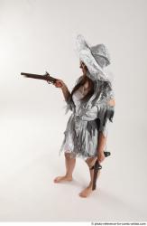 LUCI_AVIOL STANDING POSE WITH TWO GUNS